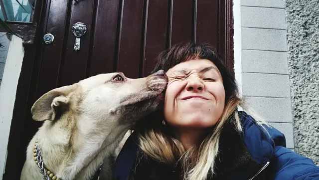 Why Do Dogs Love Us?